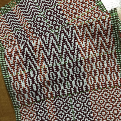 Hand towel in red, white and green.