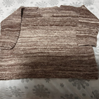 A brown and cream coloured jumper